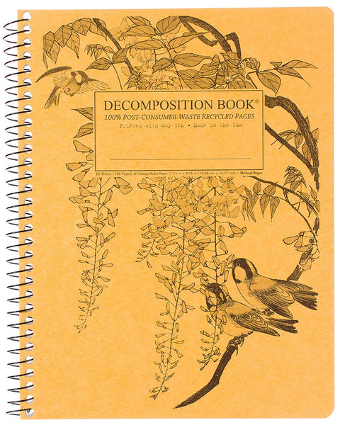 A spiral-bound decomposition book with a tan cover featuring black line drawings of birds, flowers, and branches, plus a central label that reads 'DECOMPOSITION BOOK' and '100% POST-CONSUMER-WASTE RECYCLED PAGES.'. Printed with Soy Ink. Made in the USA