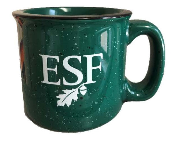 A green speckled ceramic mug with the ESF leaf and acorn logo printed in white.