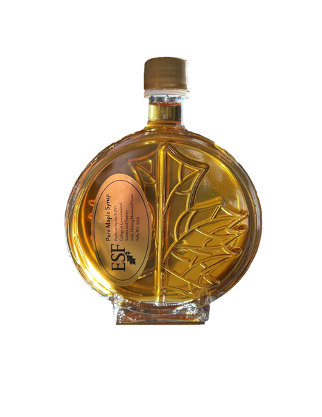 250 mL glass bottle of maple syrup imprinted with a maple leaf and label with a gold decal from Heiberg Forest